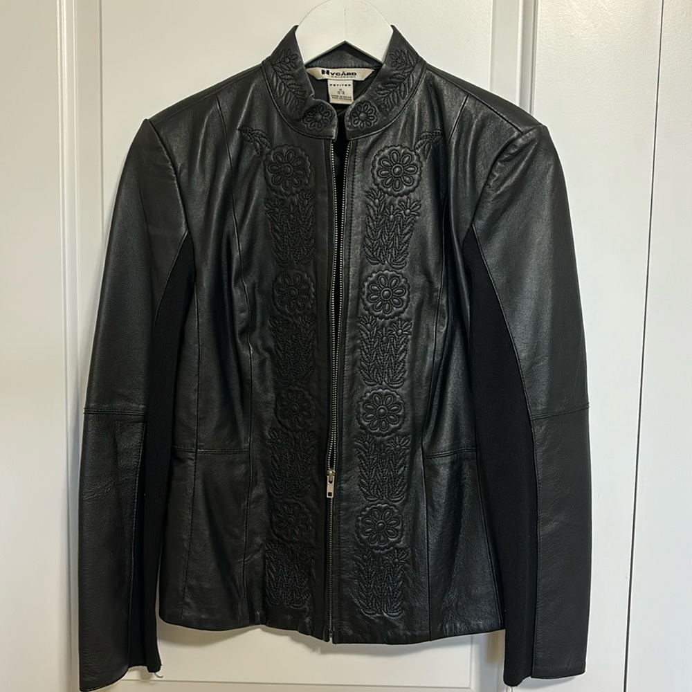 Nygard collection Petite black leather and knit fabric jacket.